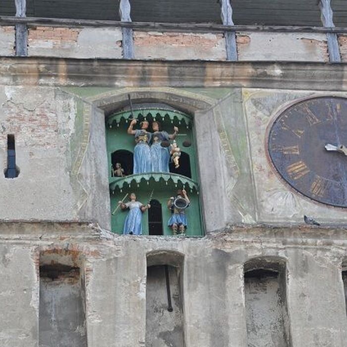 Small-Group Day tour Medieval Sighisoara, Viscri, Rupea Fortress - Sighisoara - Clock Tower - the statues